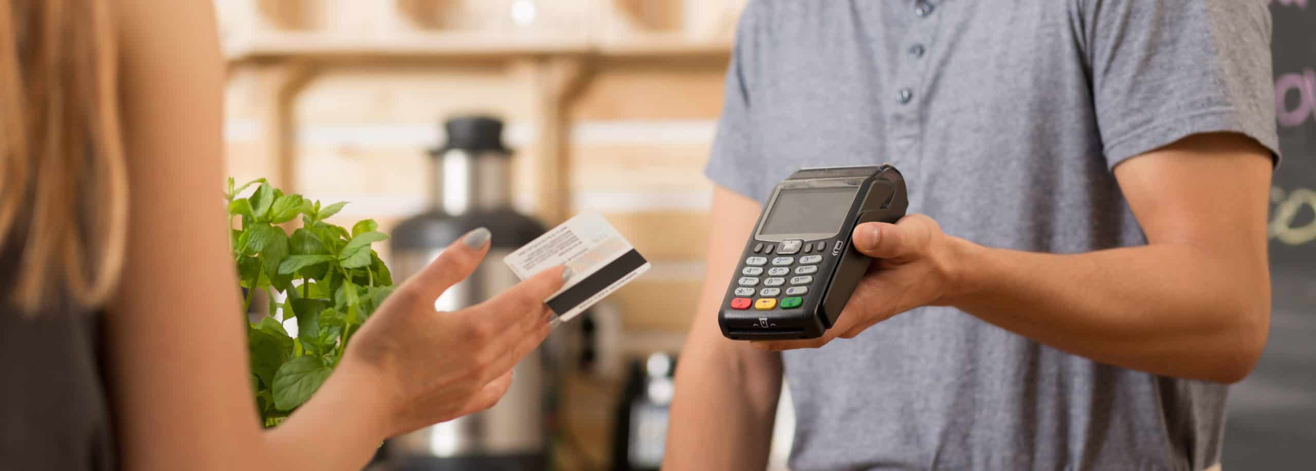 Small business customer paying with debit card