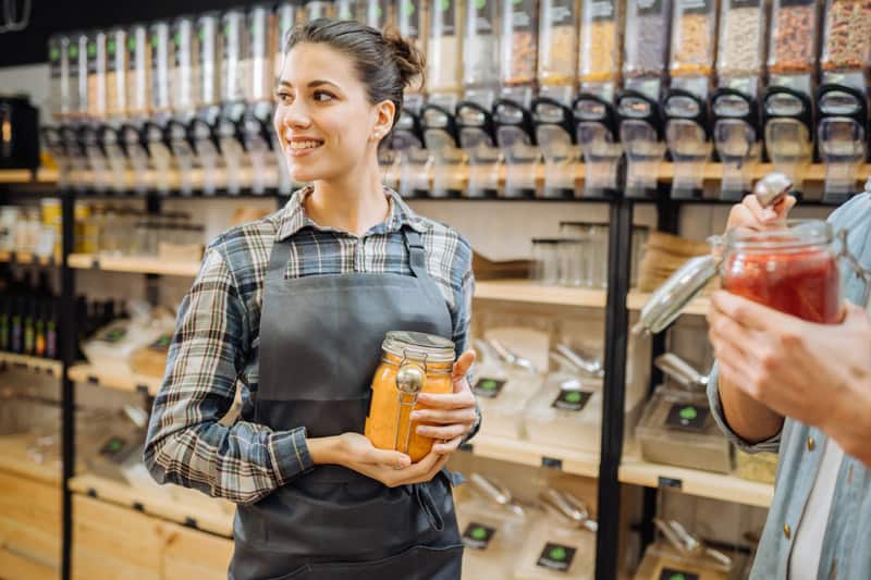 Small business Grocery store helping customer