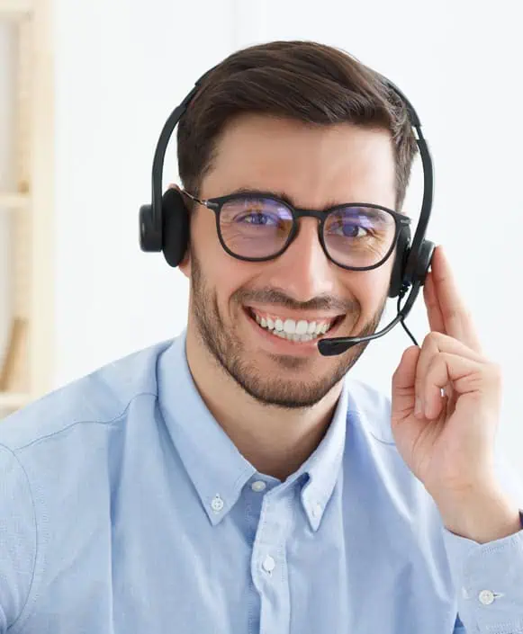 Professional customer support agent wearing headset, providing expert assistance at Host Merchant Services.