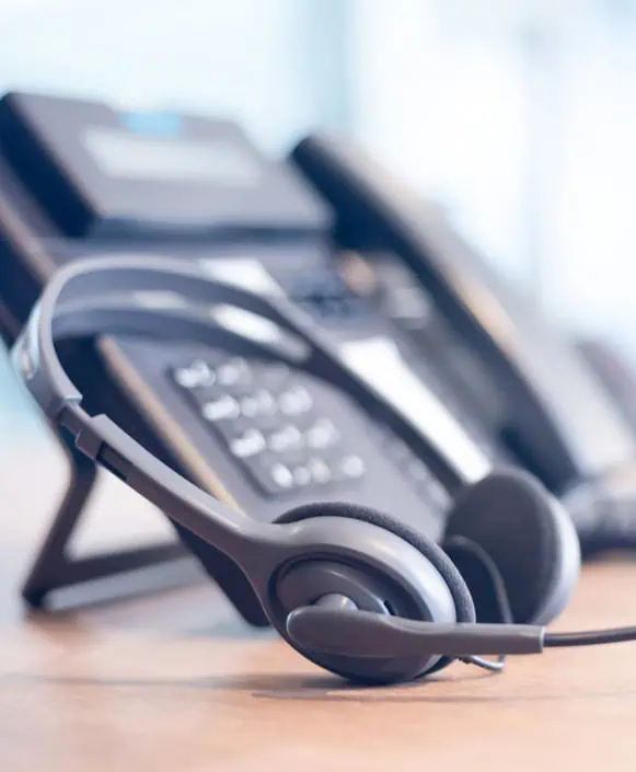 1. Headset with telephone for business communication and customer service.