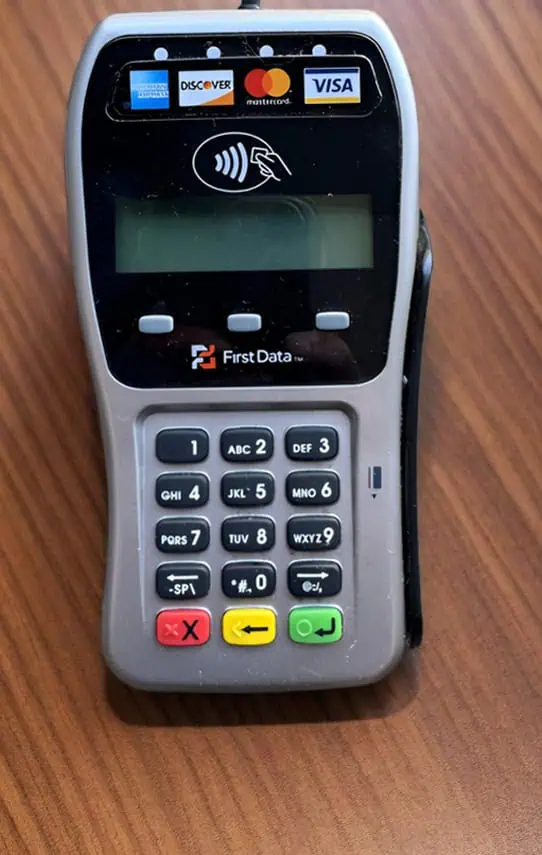 Contactless payment terminal for Host Merchant Services processing card transactions.