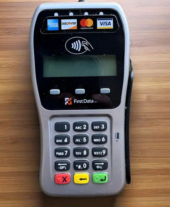 Contactless payment terminal for Host Merchant Services with multiple card options.