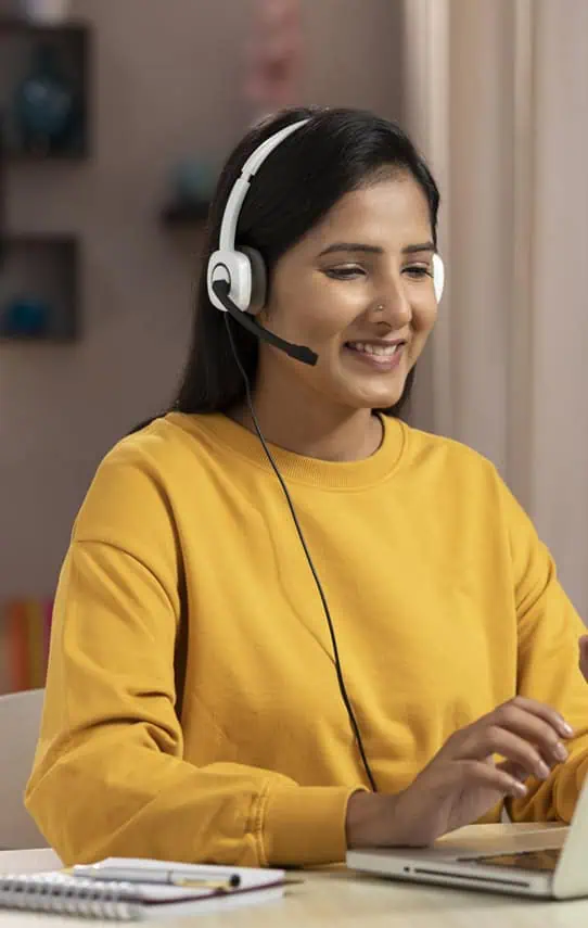 Efficient customer support representative with headset using Host Merchant Services.